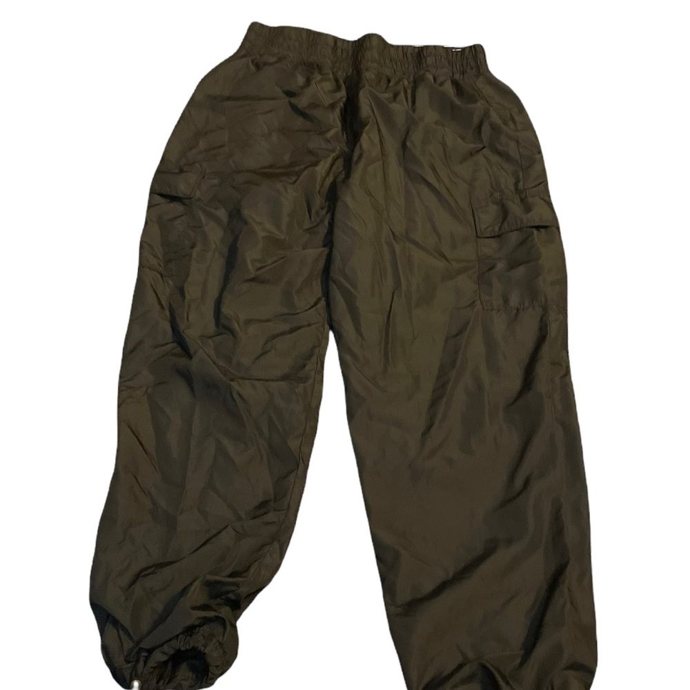 These are windbreaker pants that're soft on the inside. They are a size 11-13.